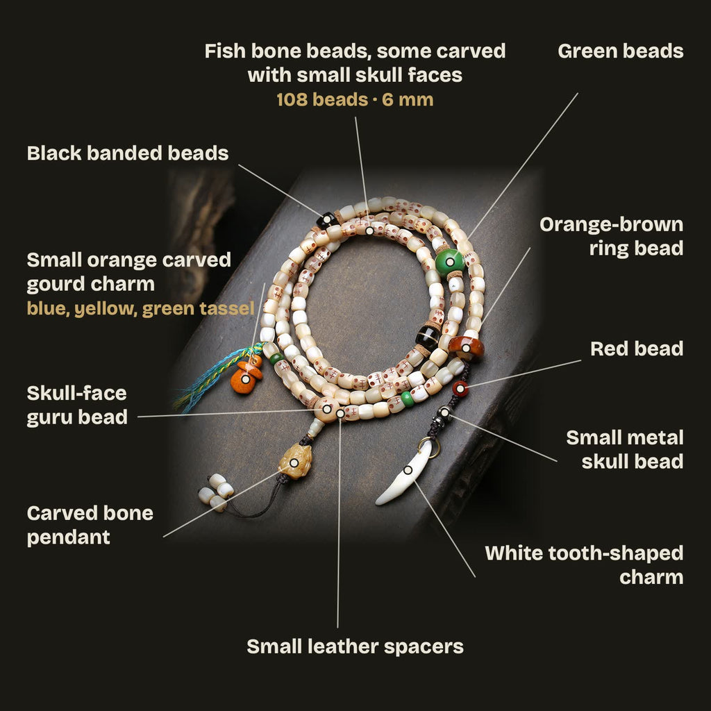 Bead guide: 108 fish bone beads 6 mm, some carved with small skull faces; skull-face guru bead, carved bone pendant, green beads, black banded beads, orange-brown ring bead, red bead, small metal skull bead, white tooth-shaped charm, orange gourd charm and leather spacers