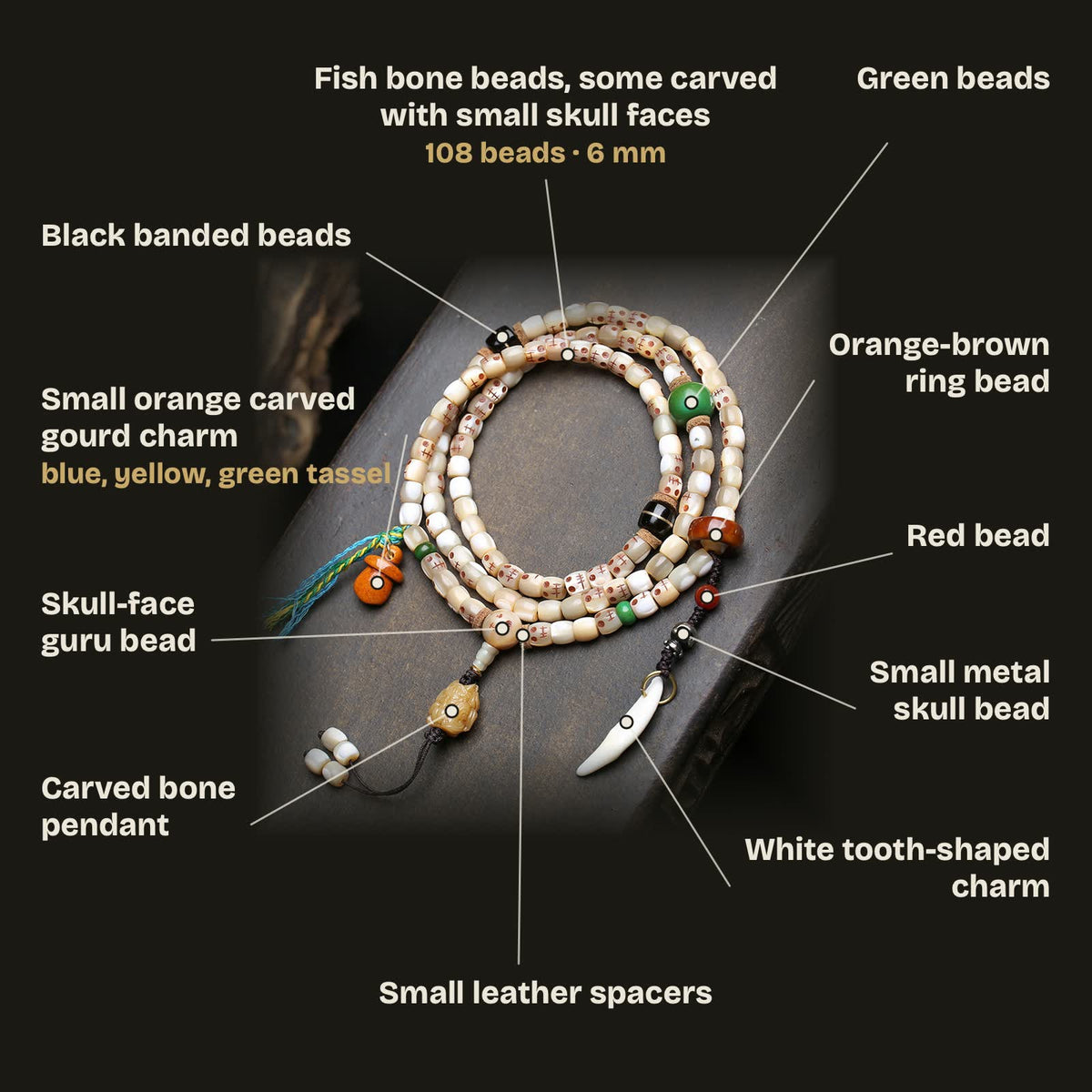 Bead guide: 108 fish bone beads 6 mm, some carved with small skull faces; skull-face guru bead, carved bone pendant, green beads, black banded beads, orange-brown ring bead, red bead, small metal skull bead, white tooth-shaped charm, orange gourd charm and leather spacers
